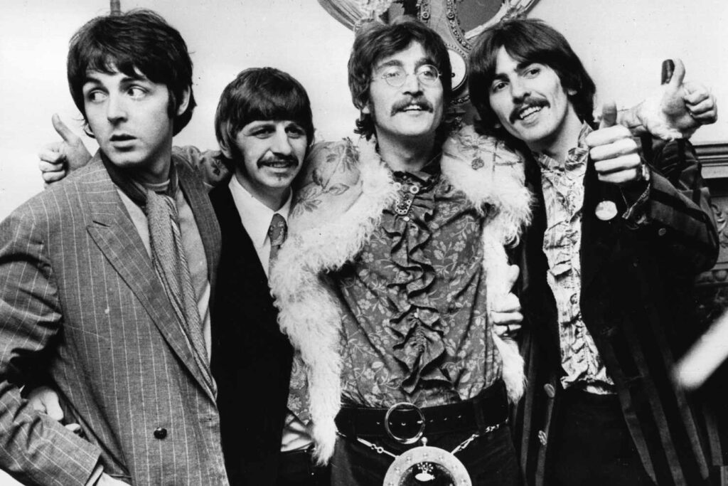 What factors contributed to The Beatles' disbandment in 1970