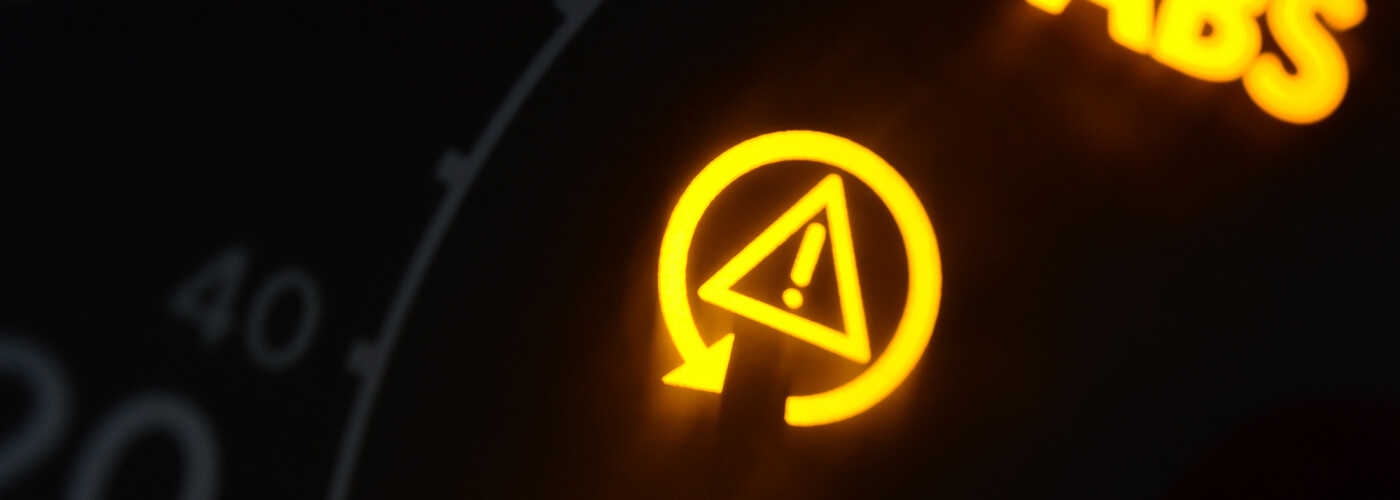 triangle light on dash meaning